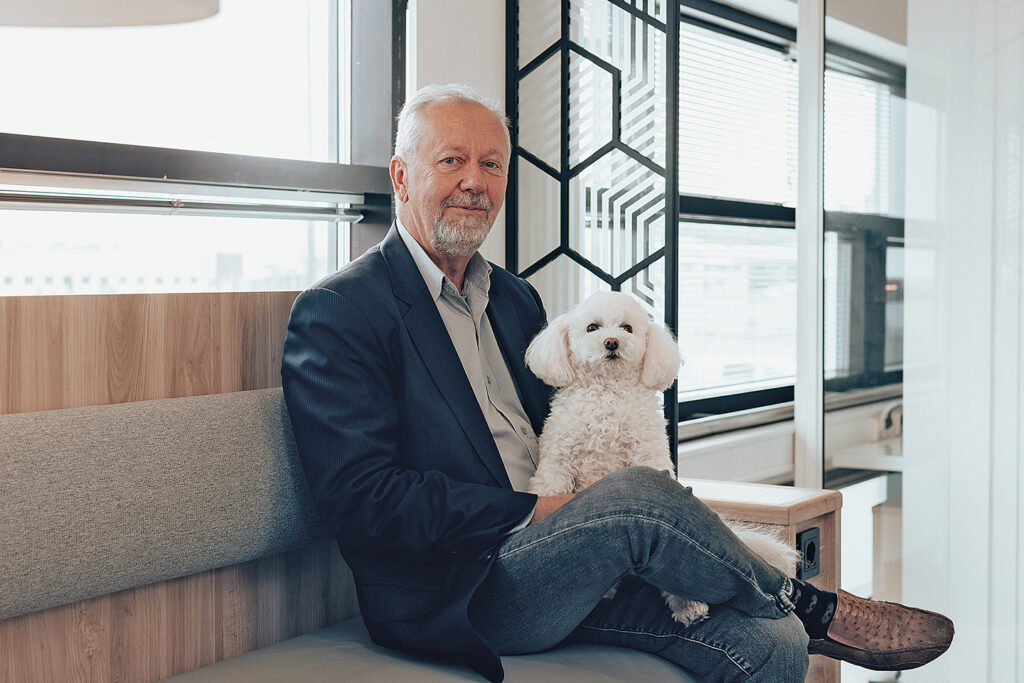 Wasaline’s Managing Director Peter Ståhlberg photographed holding a small dog.