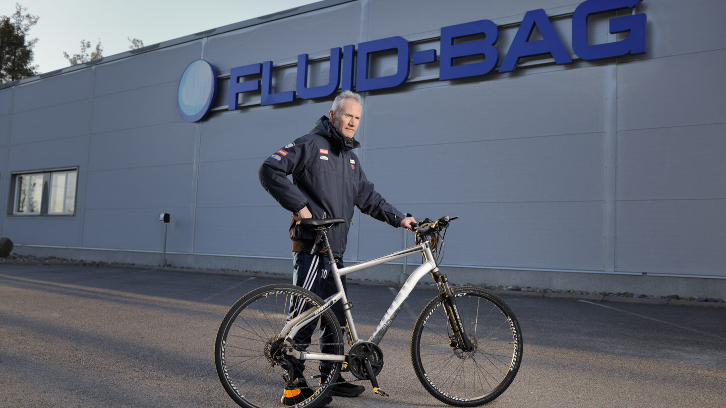 Tommy Haglund pictured in front of Fluid-Bag's facility with his bike.