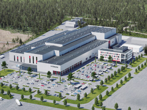 An illustration of the future Hitachi Energy Park. The facility is shown from high above with a lot of cars in its parking lot.